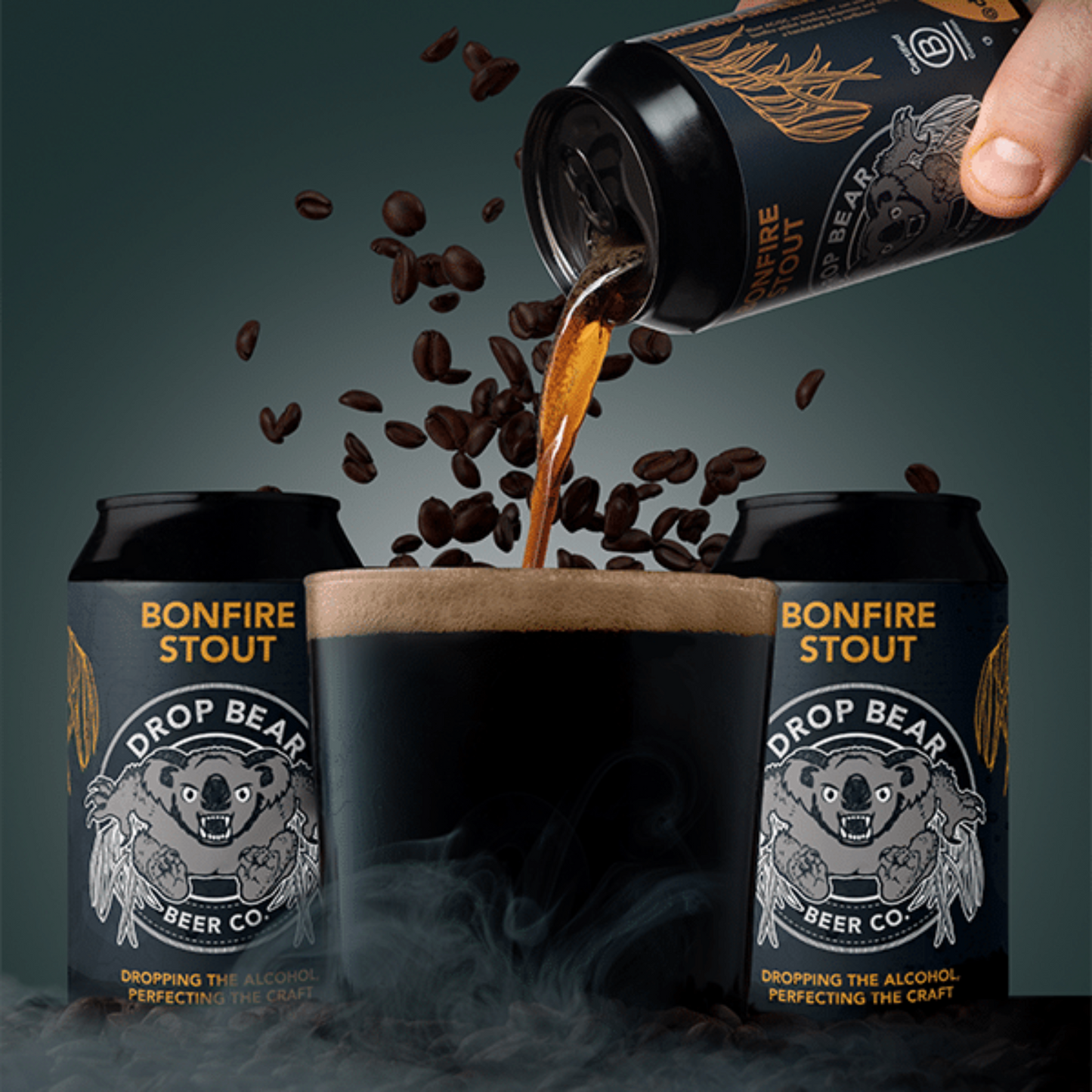 Can of Drop Bear Beer Co. Bonfire Stout being poured into a glass with coffee beans falling in.