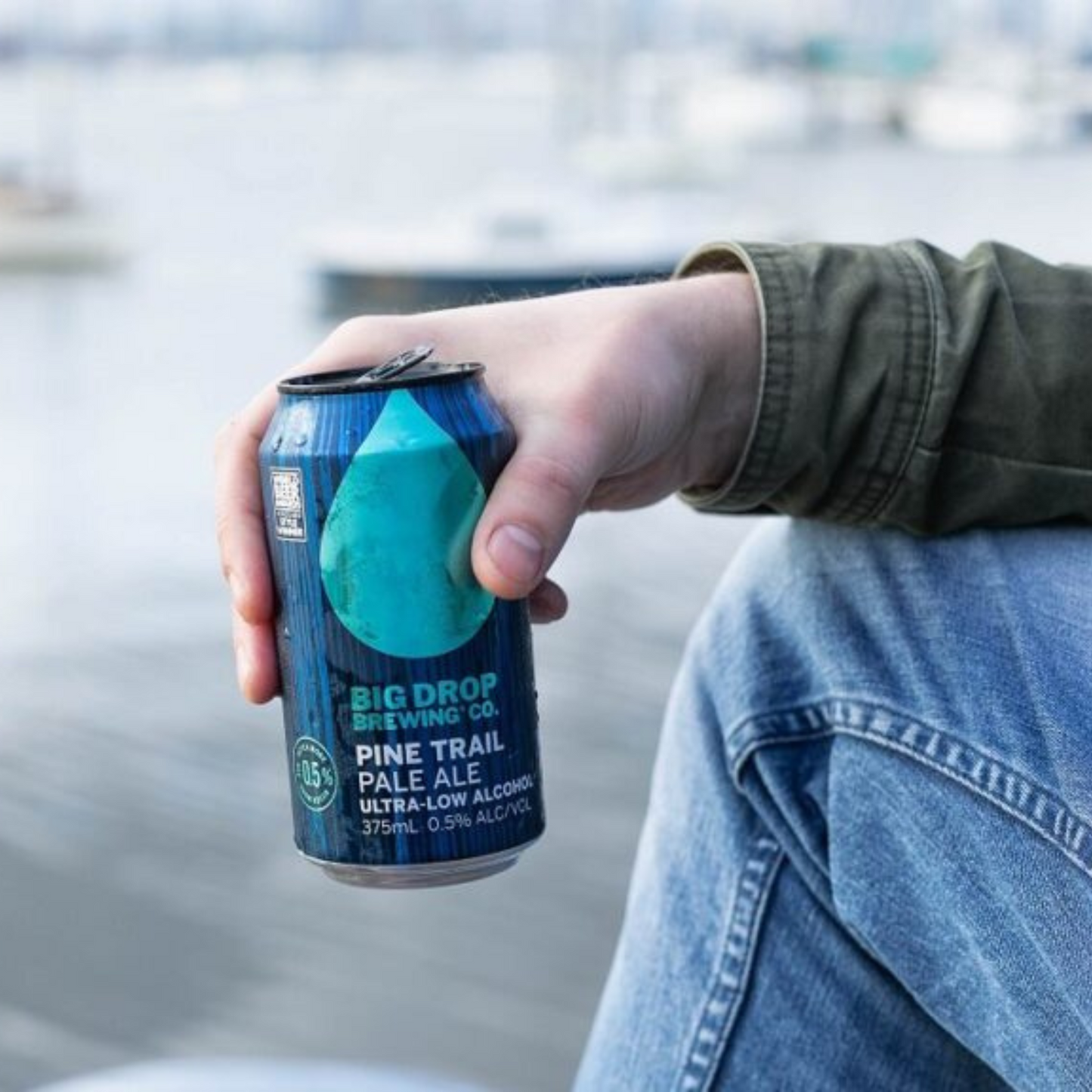 Big Drop Pine Trail Pale Ale Can In mans hand 