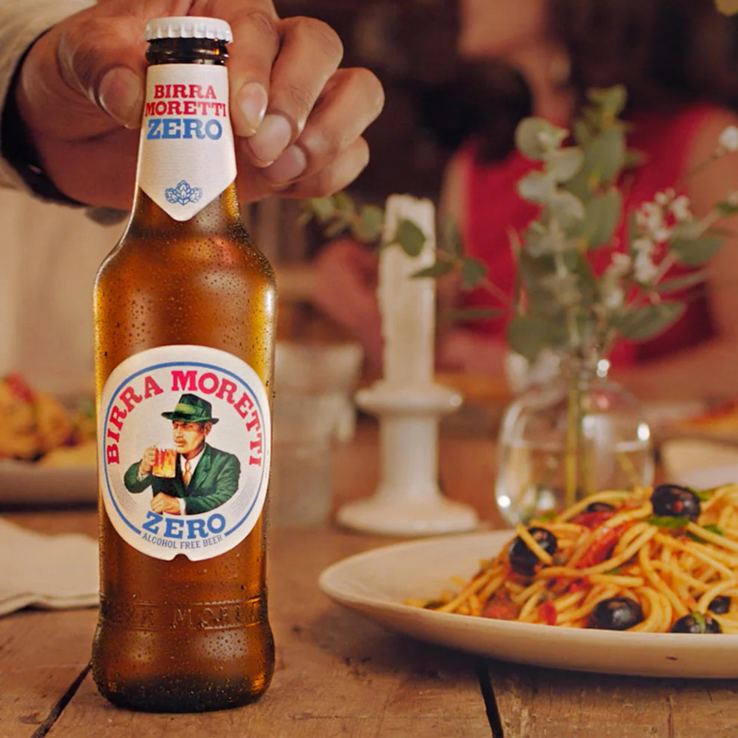 Birra Moretti Zero Bottle with food